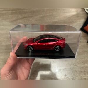 BURAGO GENUINE TESLA MODEL 3 RED 1:43 MULTICOAT DIECAST CAR IN PLASTIC CASE